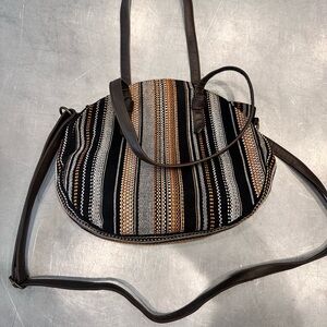 Francesca's Artisan Striped Tambourine Tote bag with a removable shoulder strap